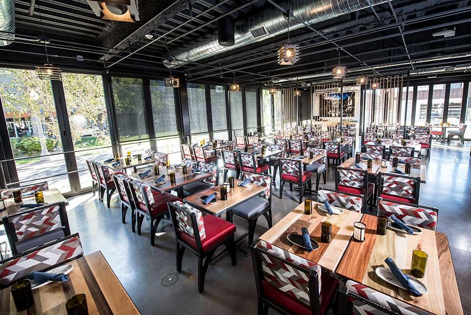 A large dining area with many tables and chairs